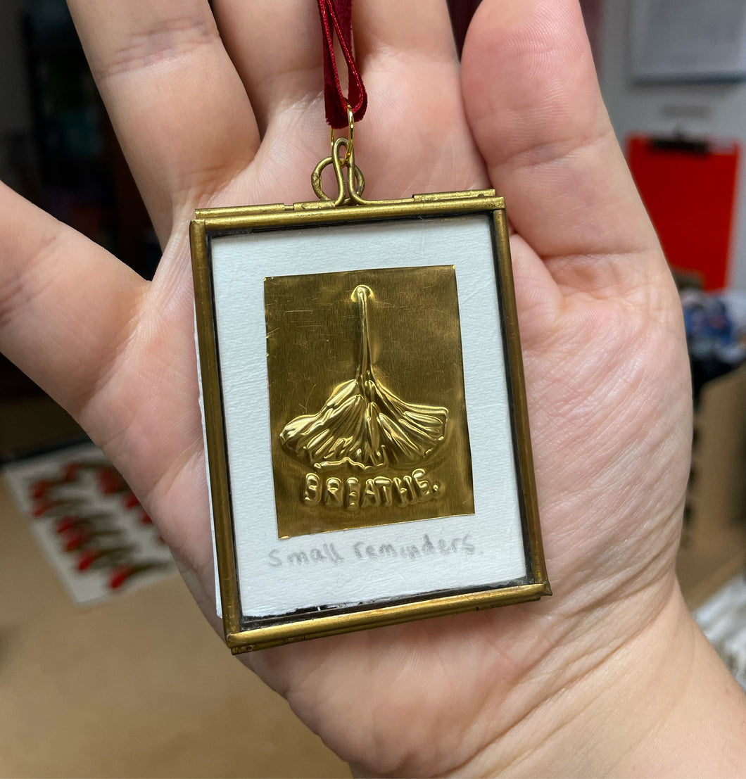 Breathe Gingko embossing in brass frame 5cm x 7cm